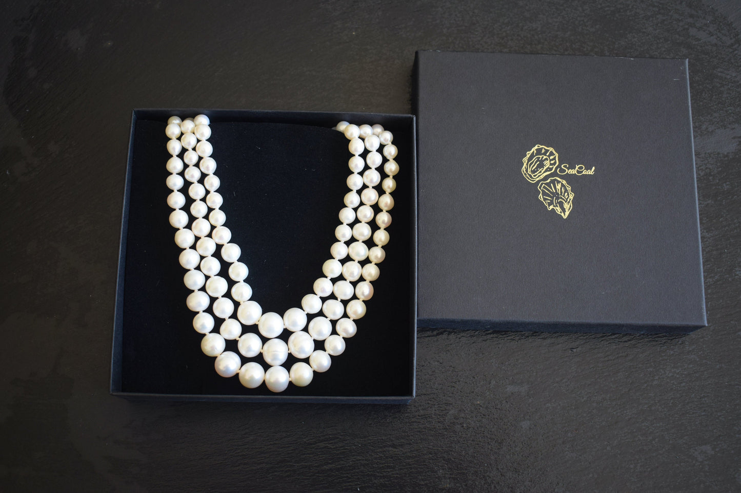 Graduated Pearl Necklace in White with Sterling Silver
