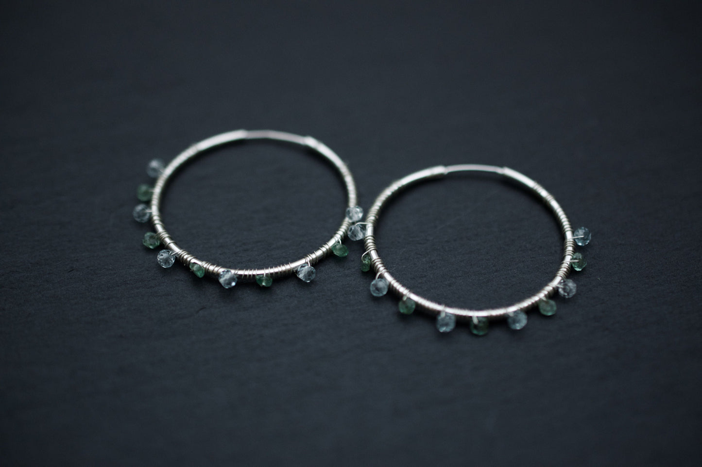 Sterling Silver Hoop Earrings in Aquamarine and Emerald.