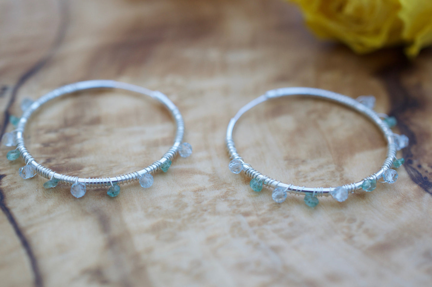 Sterling Silver Hoop Earrings in Aquamarine and Emerald.